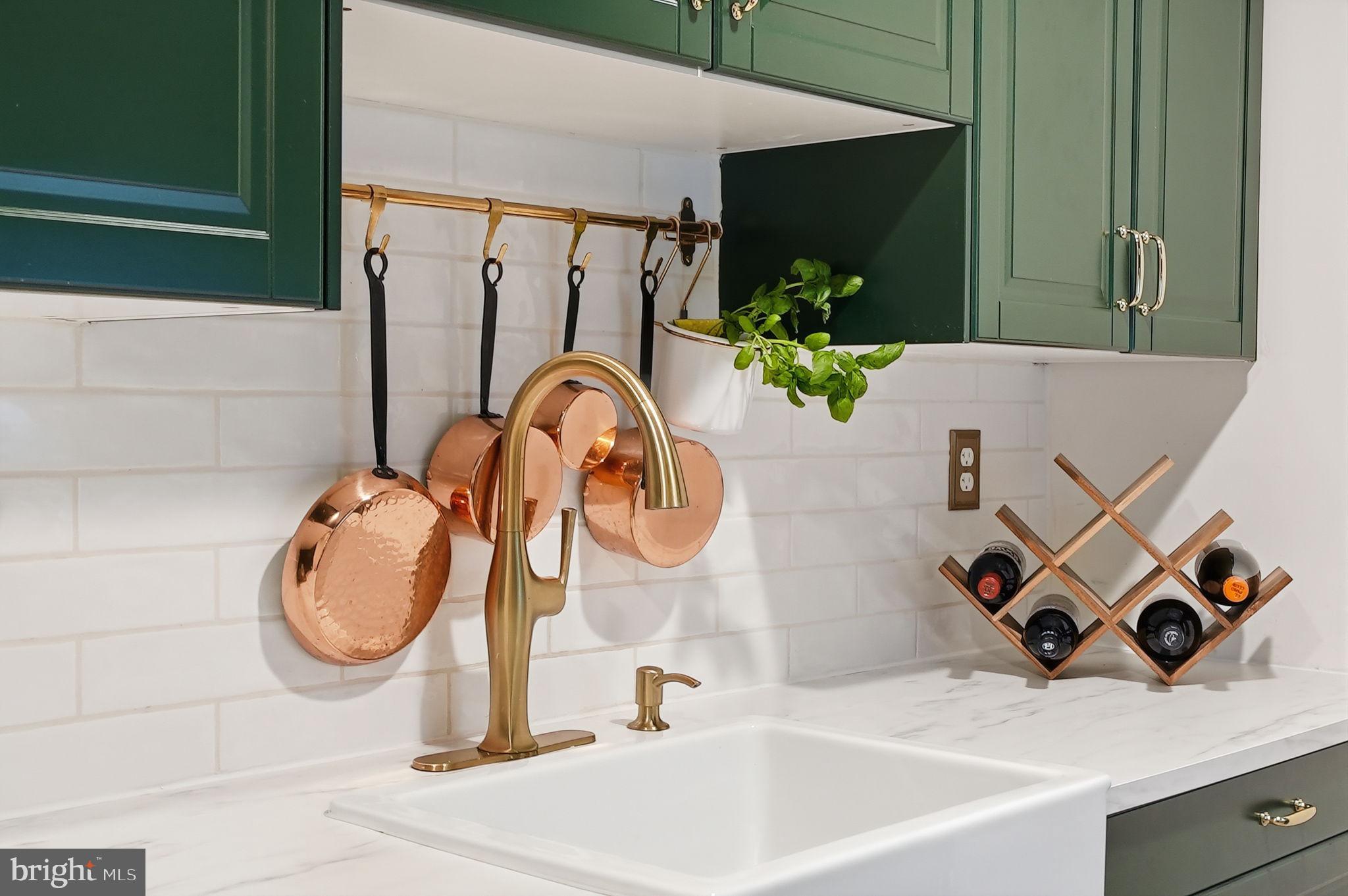 8231 Kings Charter Lane, Unit 108 Springfield, VA 22152 - Photo 14 of 37 a bathroom with a sink and mirror