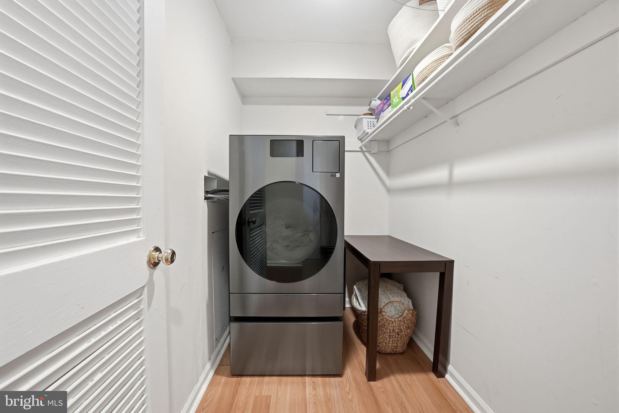 8231 Kings Charter Lane, Unit 108 Springfield, VA 22152 - Photo 29 of 37 a view of entryway with washer and dryer
