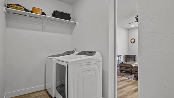 a utility room with dryer and washer
