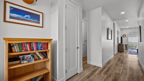 a view of a hallway with closet