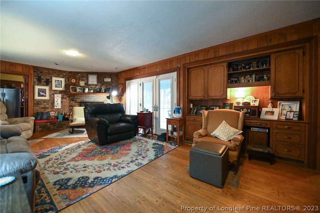 811 Butler Island Road Roseboro, NC 28382 - Photo 11 of 43 a living room with furniture window and a table