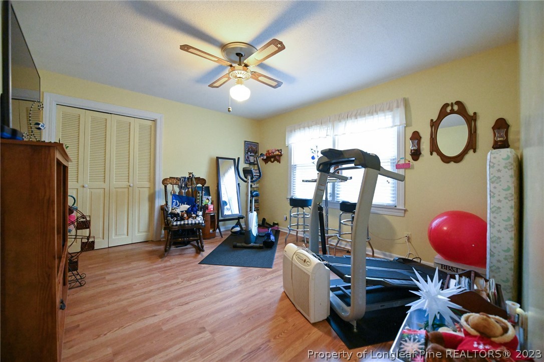 811 Butler Island Road Roseboro, NC 28382 - Photo 34 of 43 a view of a livingroom with furniture and a ceiling fan
