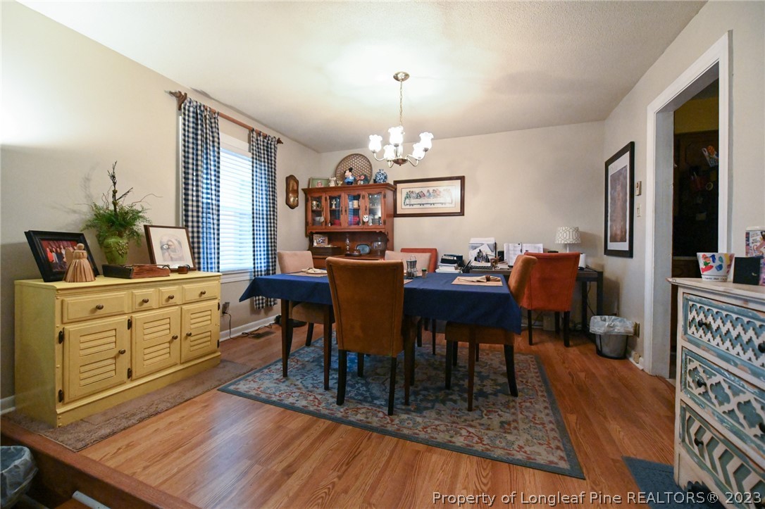 811 Butler Island Road Roseboro, NC 28382 - Photo 9 of 43 a view of a dining room with furniture