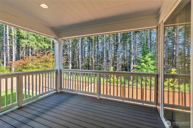 a view of a large window with wooden floor