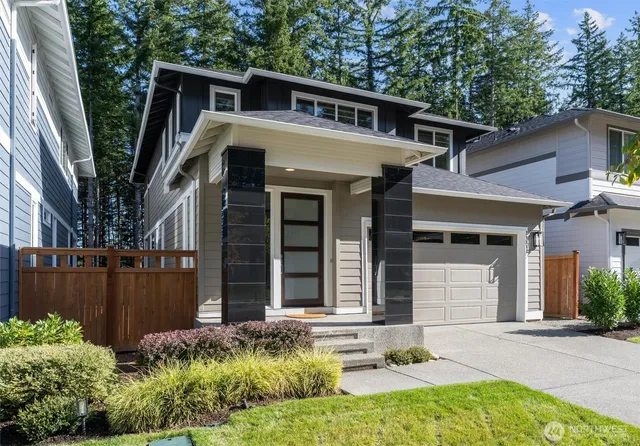 front view of a house with a small yard