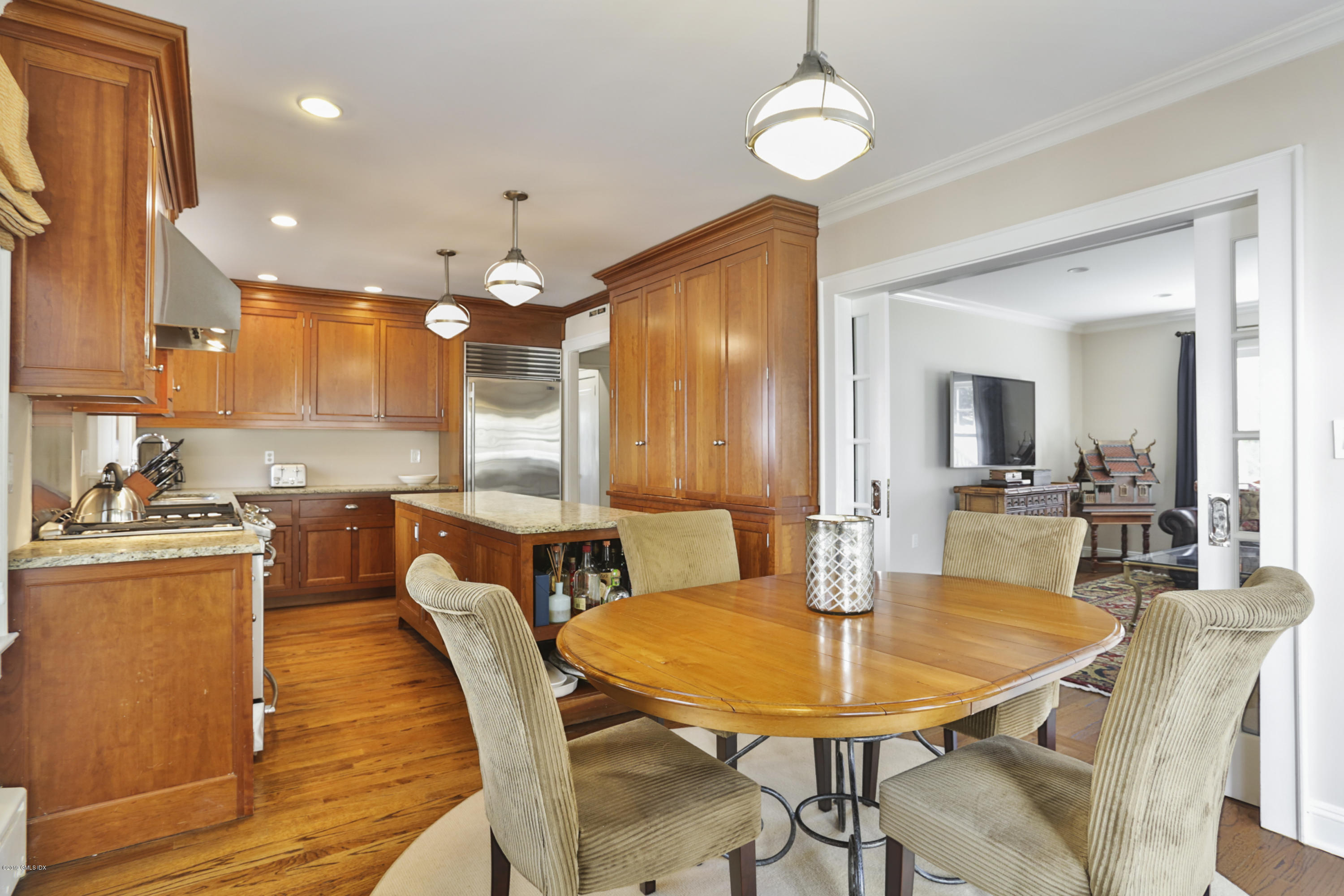 36 Valleywood Road Cos Cob, CT 06830 - Photo 13 of 45 a view of a dining room with furniture window and wooden floor