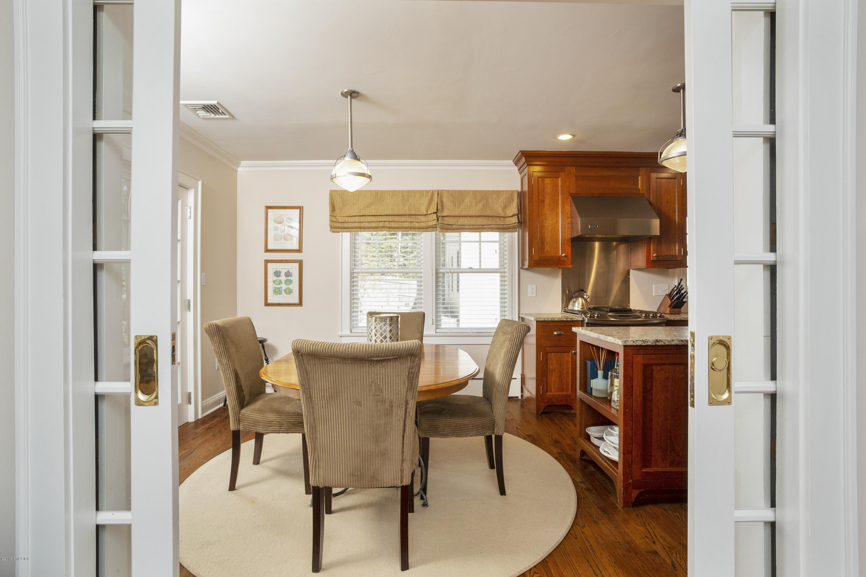 36 Valleywood Road Cos Cob, CT 06830 - Photo 14 of 45 a view of a dining room with furniture window and outside view