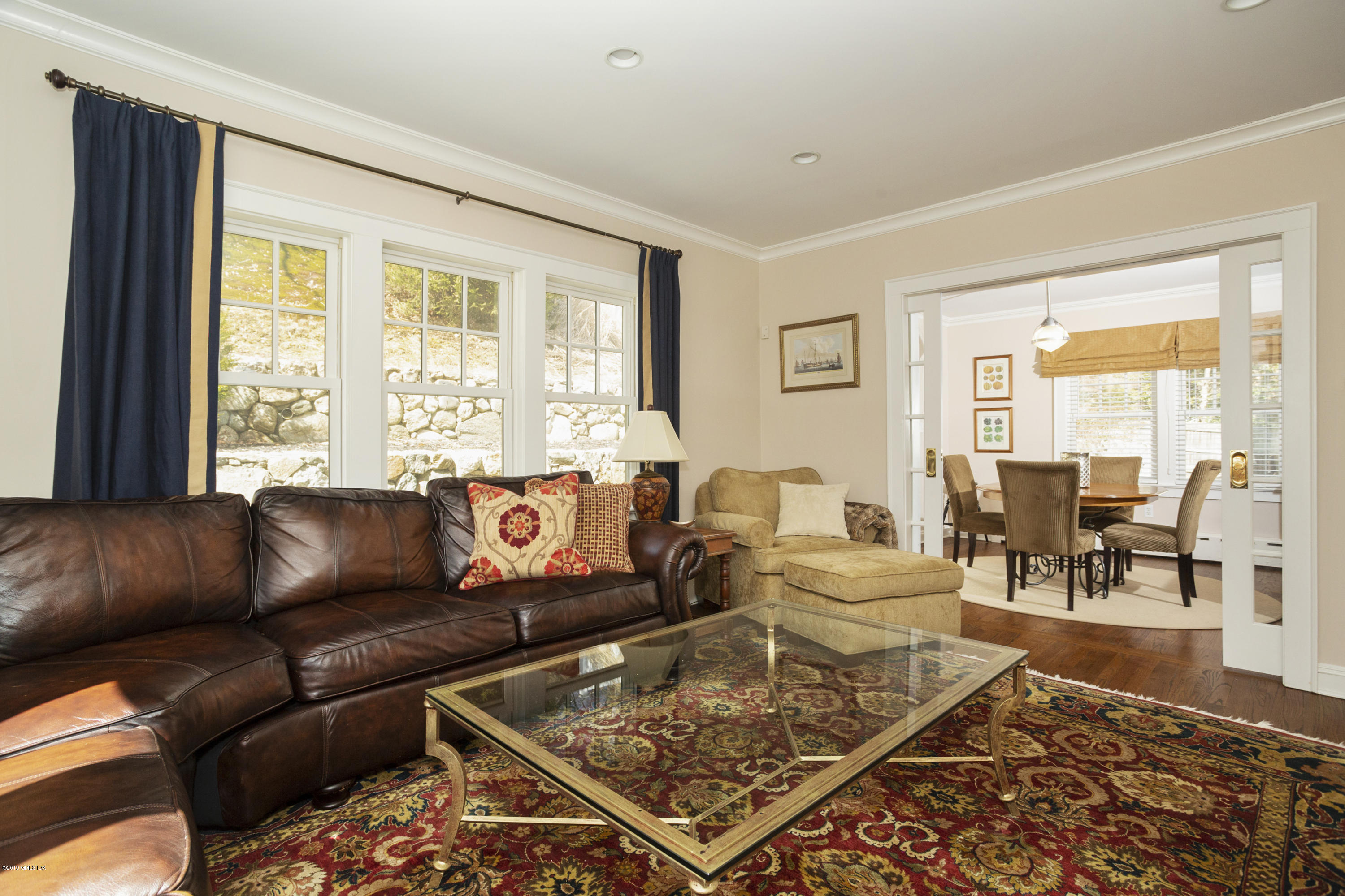 36 Valleywood Road Cos Cob, CT 06830 - Photo 16 of 45 a living room with furniture and a large window