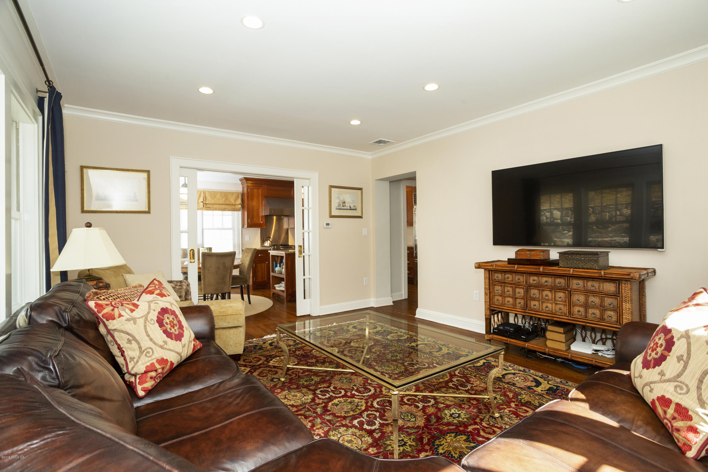 36 Valleywood Road Cos Cob, CT 06830 - Photo 17 of 45 a living room with furniture and a flat screen tv