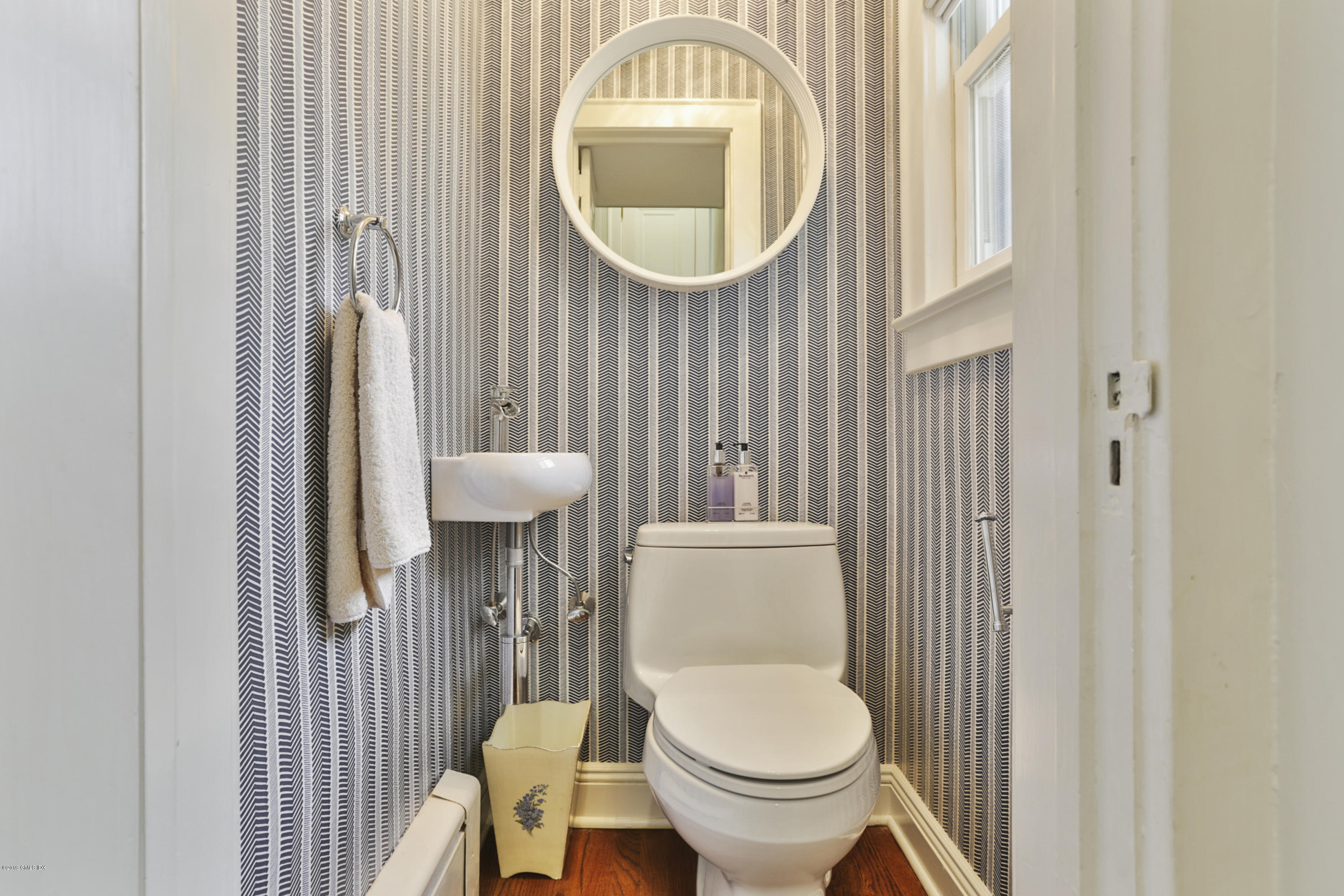 36 Valleywood Road Cos Cob, CT 06830 - Photo 19 of 45 a bathroom with a toilet and a sink