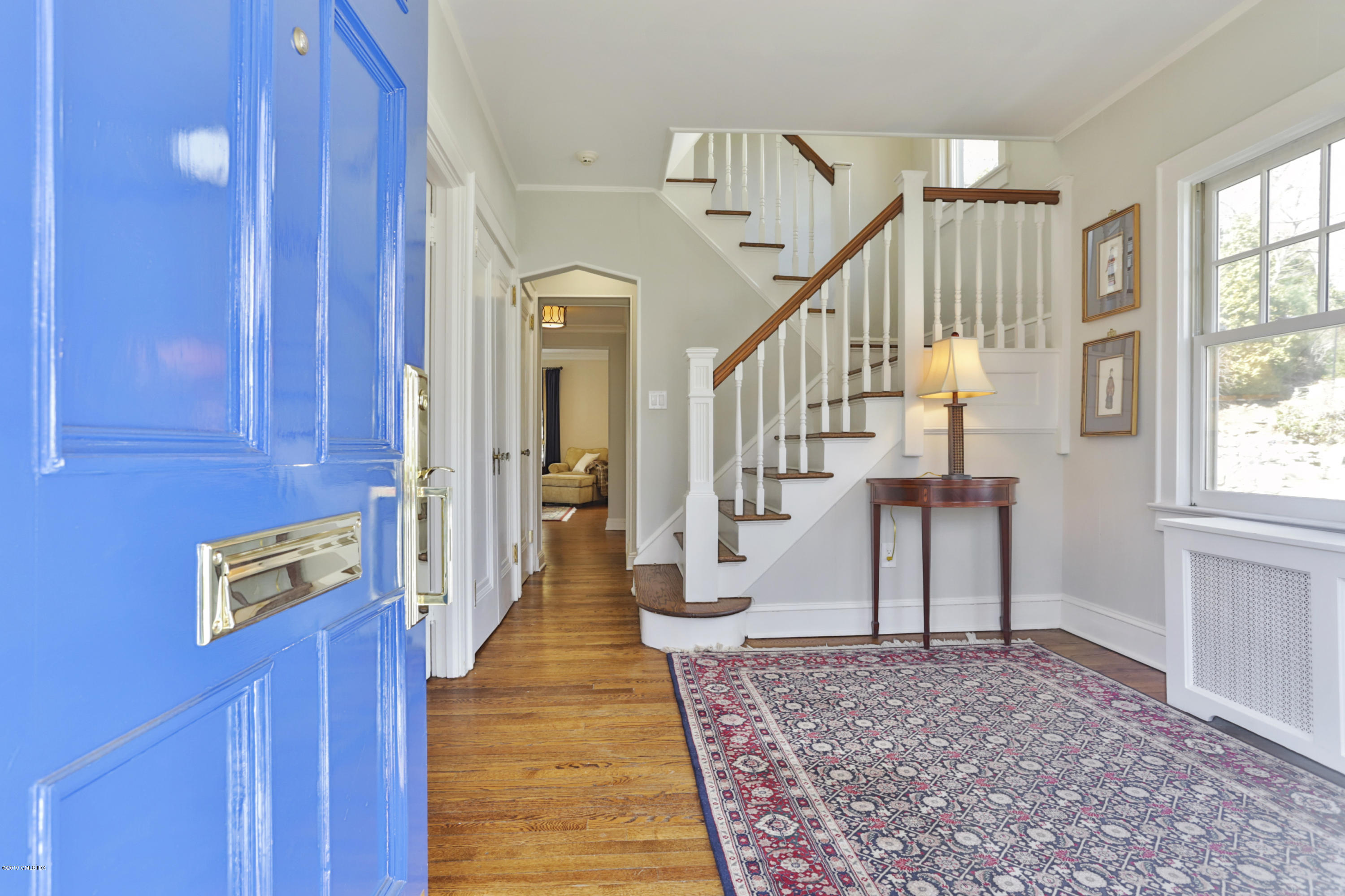 36 Valleywood Road Cos Cob, CT 06830 - Photo 2 of 45 a view of entryway and hall with wooden floor