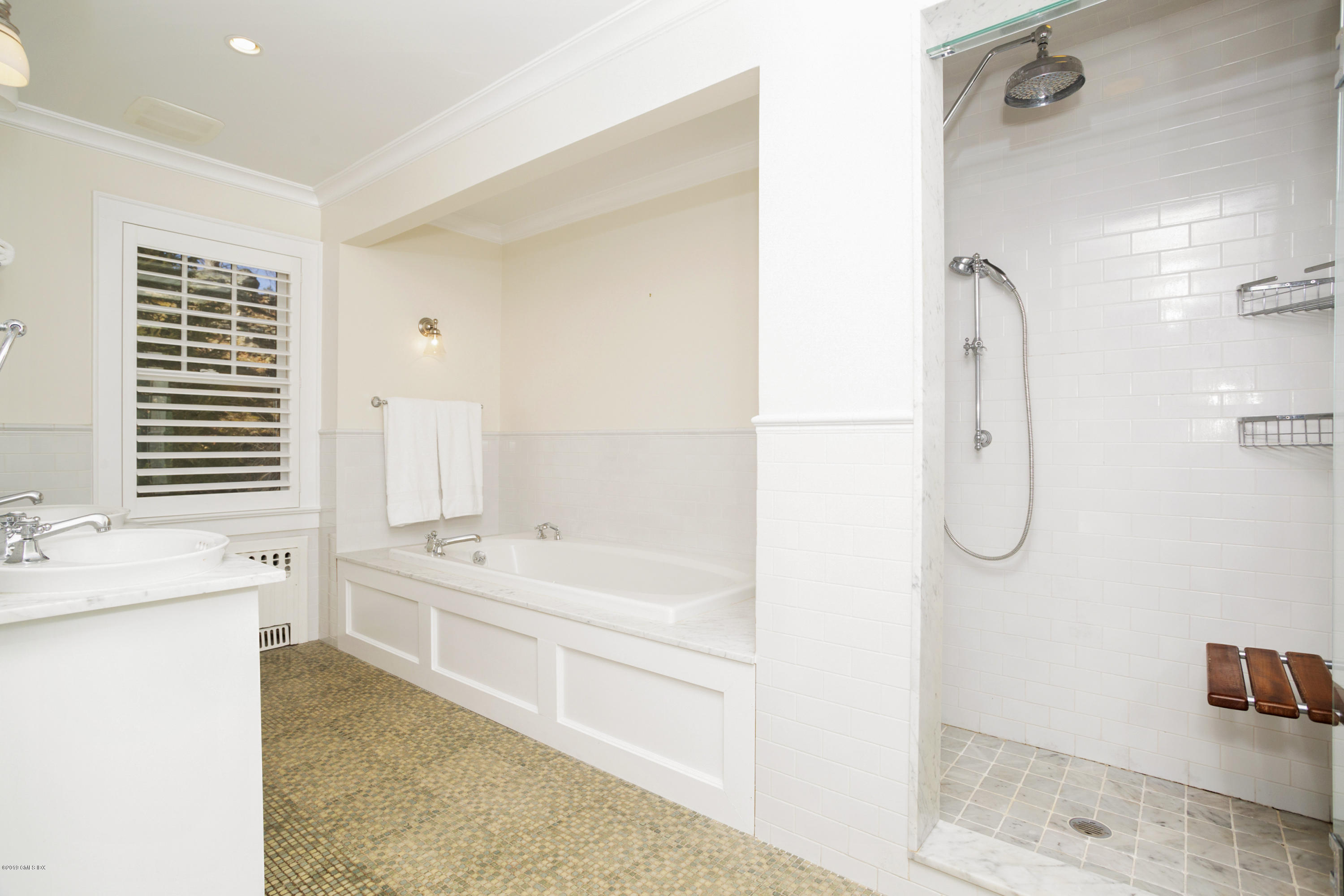 36 Valleywood Road Cos Cob, CT 06830 - Photo 23 of 45 a bathroom with a tub sink and mirror