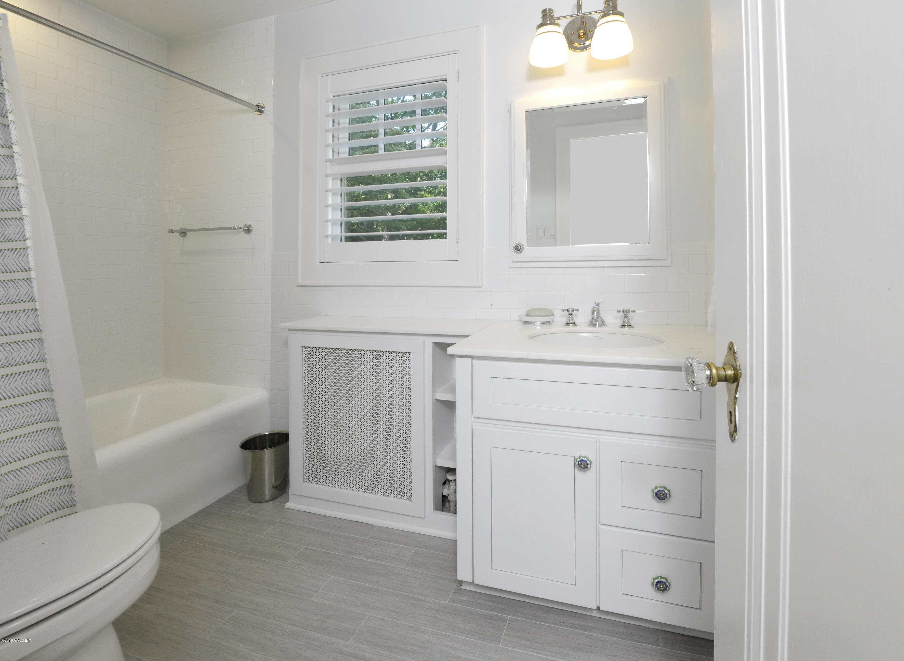 36 Valleywood Road Cos Cob, CT 06830 - Photo 26 of 45 a bathroom with a sink toilet vanity and tub