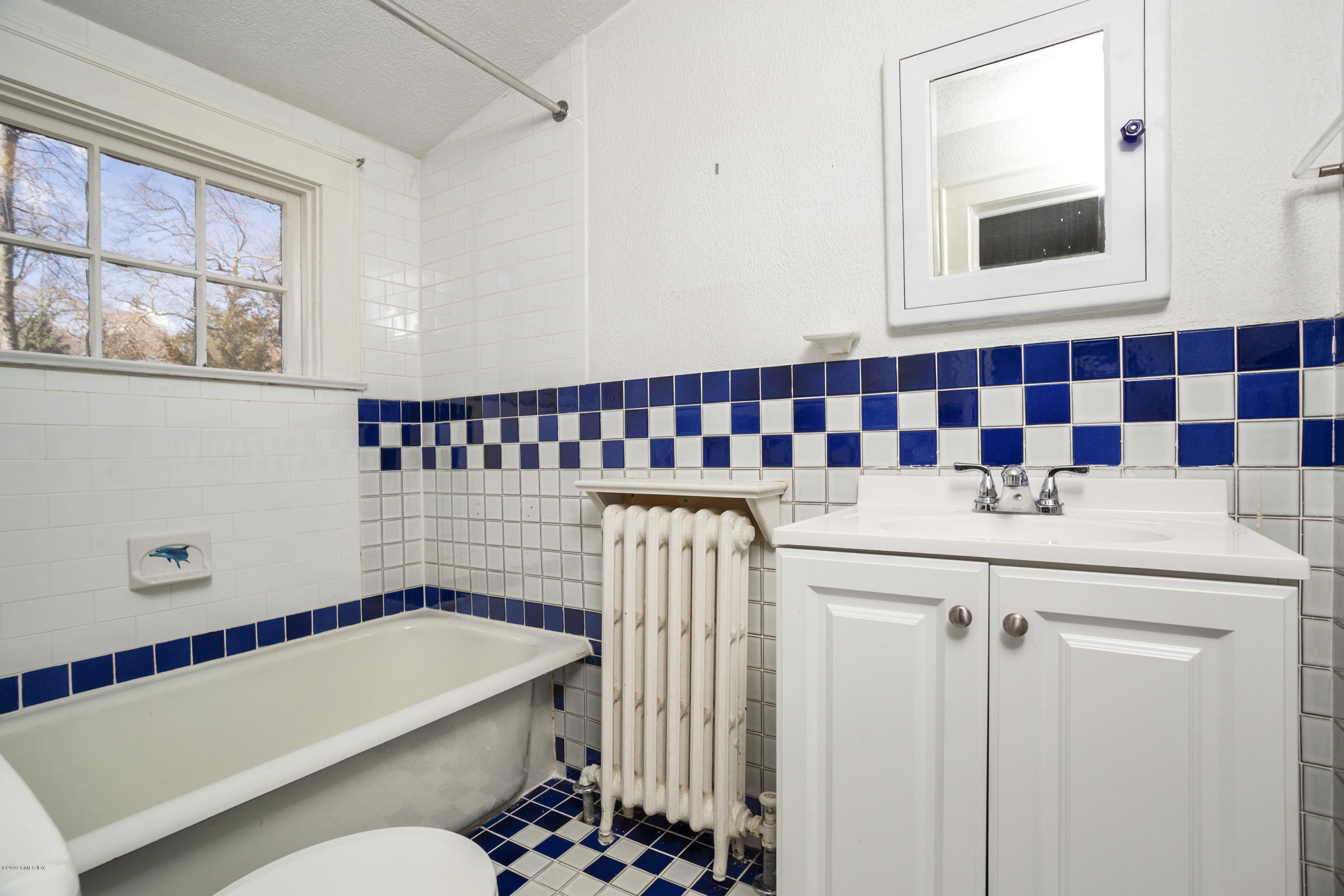36 Valleywood Road Cos Cob, CT 06830 - Photo 29 of 45 a bathroom with a bathtub and a shower