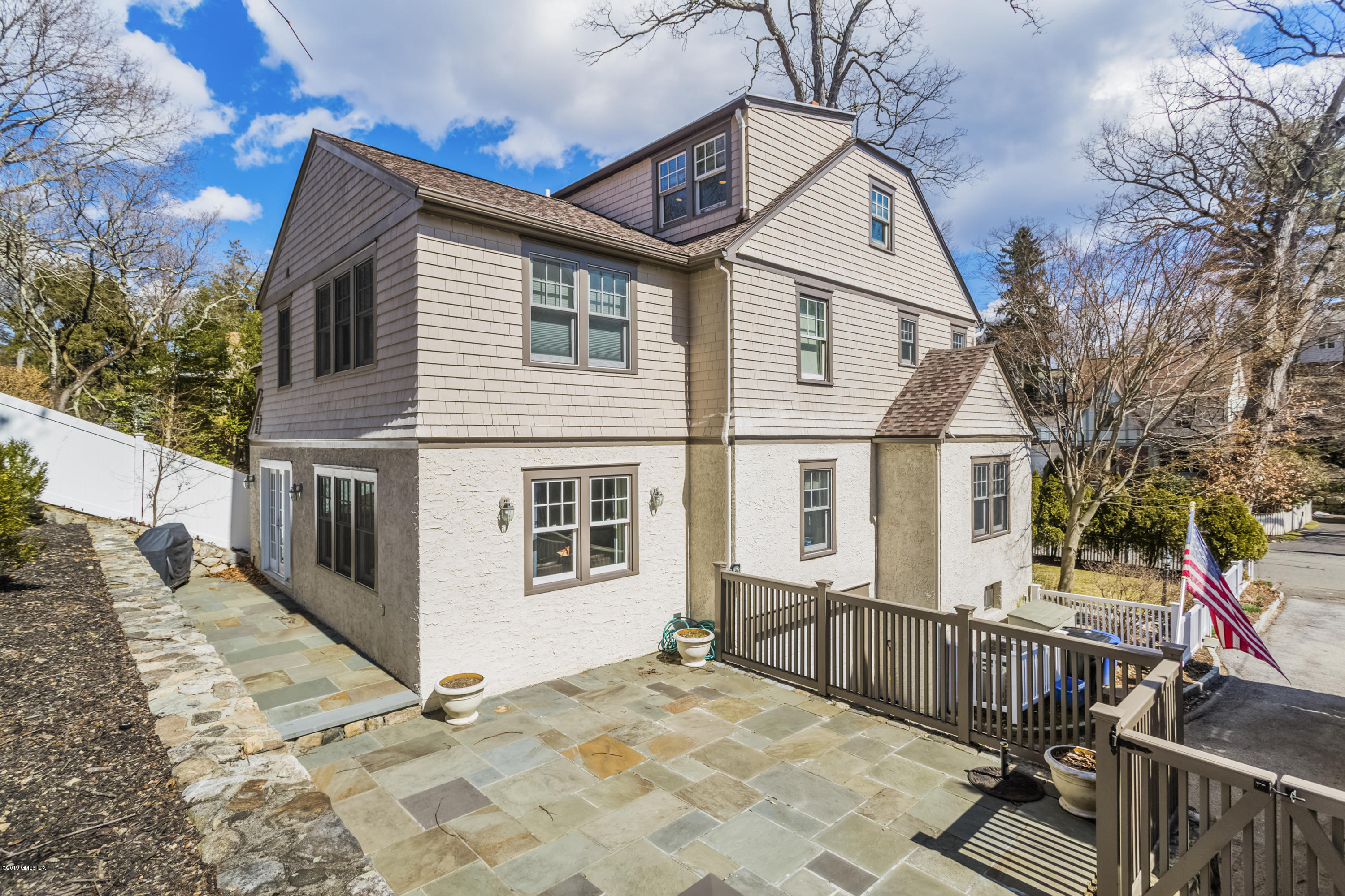 36 Valleywood Road Cos Cob, CT 06830 - Photo 33 of 45 a view of a house with wooden fence