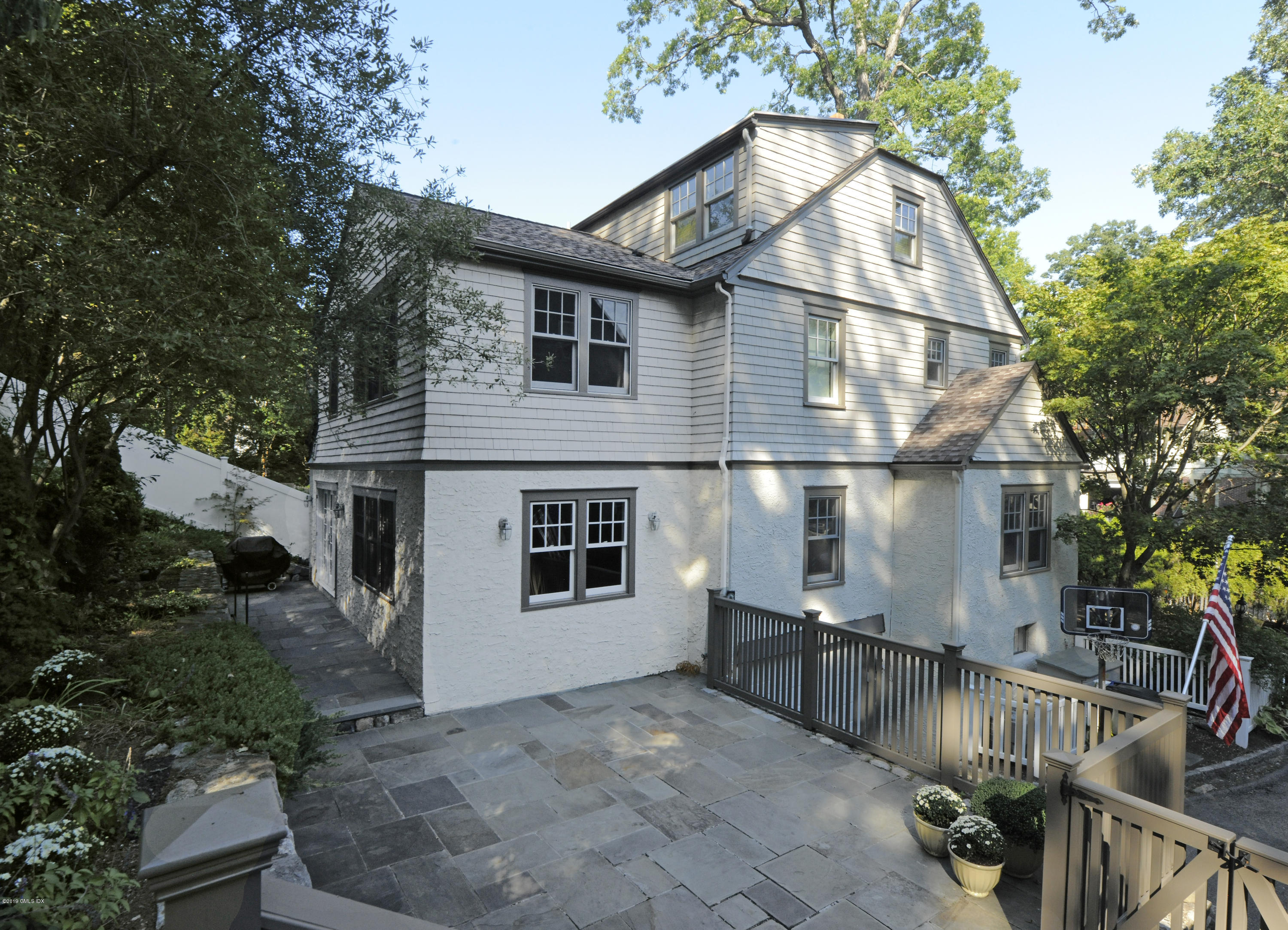 36 Valleywood Road Cos Cob, CT 06830 - Photo 34 of 45 a view of a house with a backyard