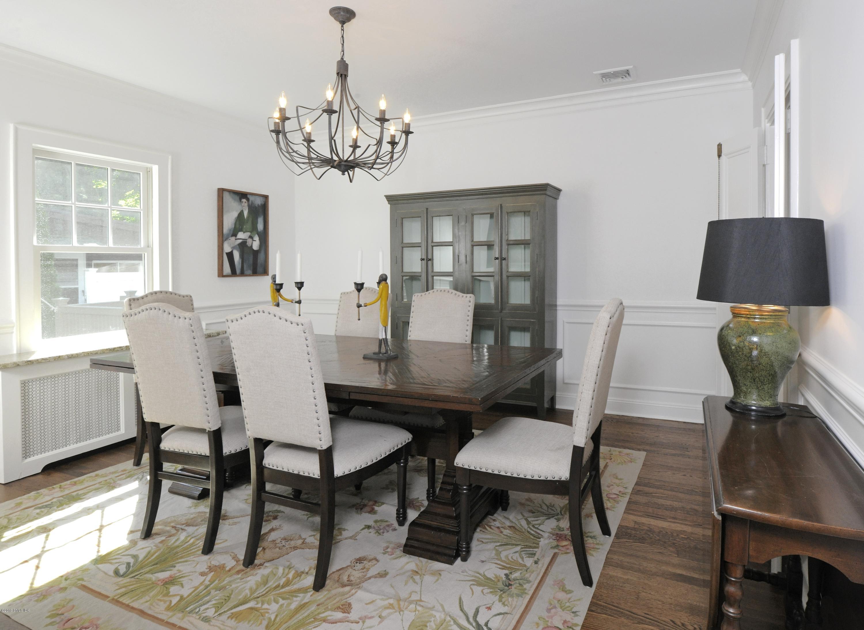 36 Valleywood Road Cos Cob, CT 06830 - Photo 8 of 45 a view of a dining room with furniture and chandelier