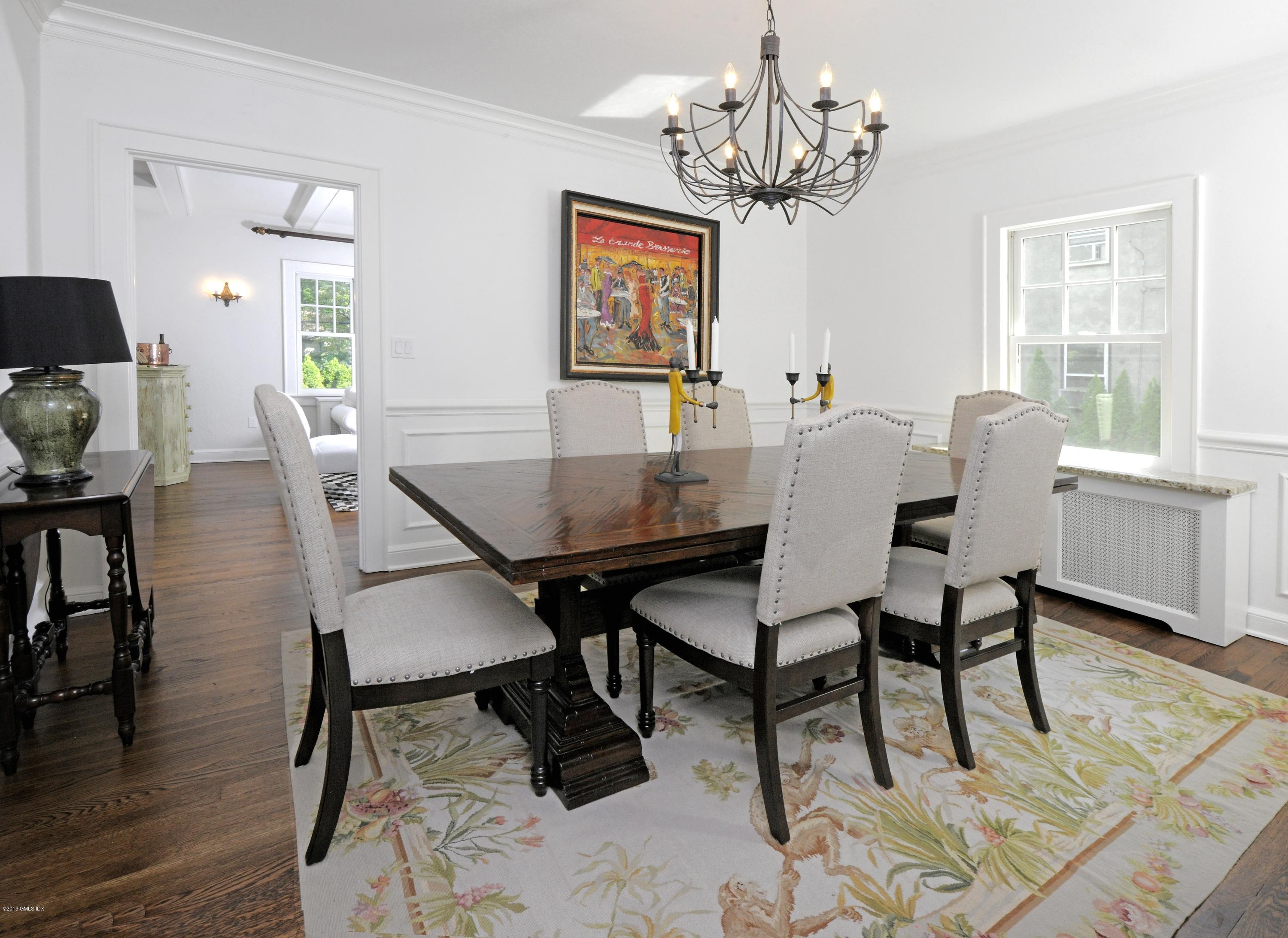 36 Valleywood Road Cos Cob, CT 06830 - Photo 9 of 45 a view of a dining room with furniture window and wooden floor