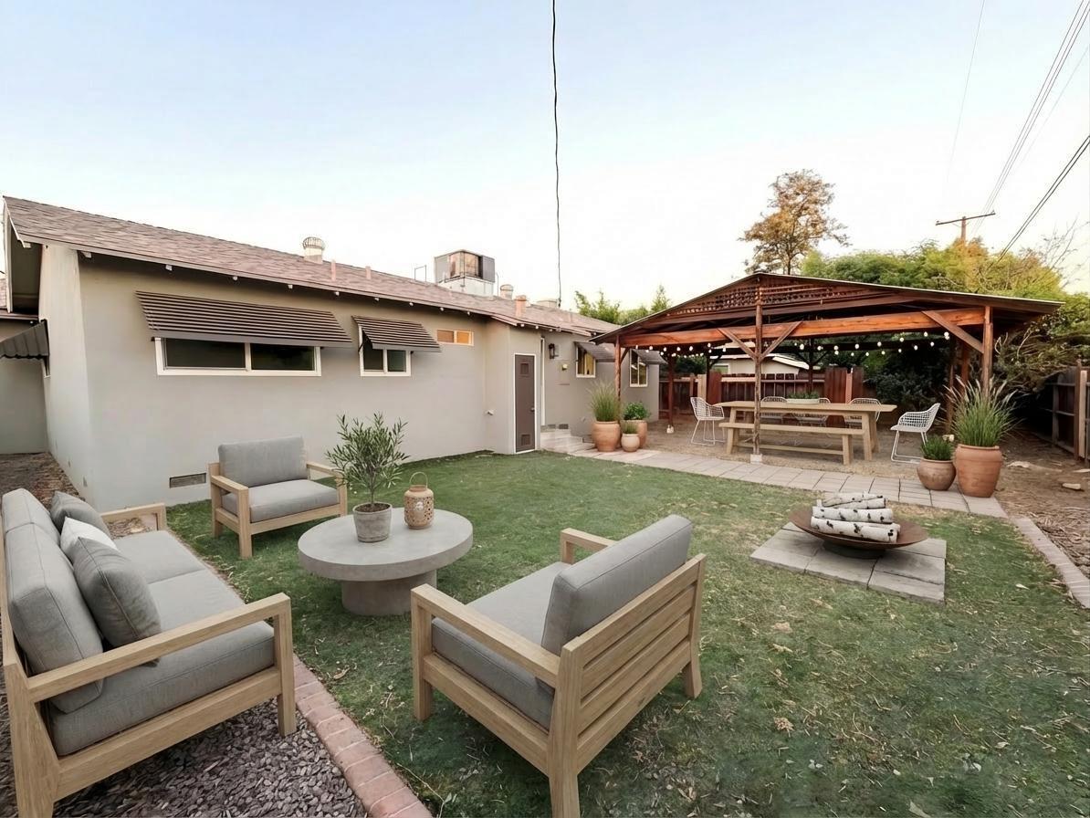 302 Sequoia Drive Exeter, CA 93221 - Photo 20 of 20 a view of a patio with couches and potted plants