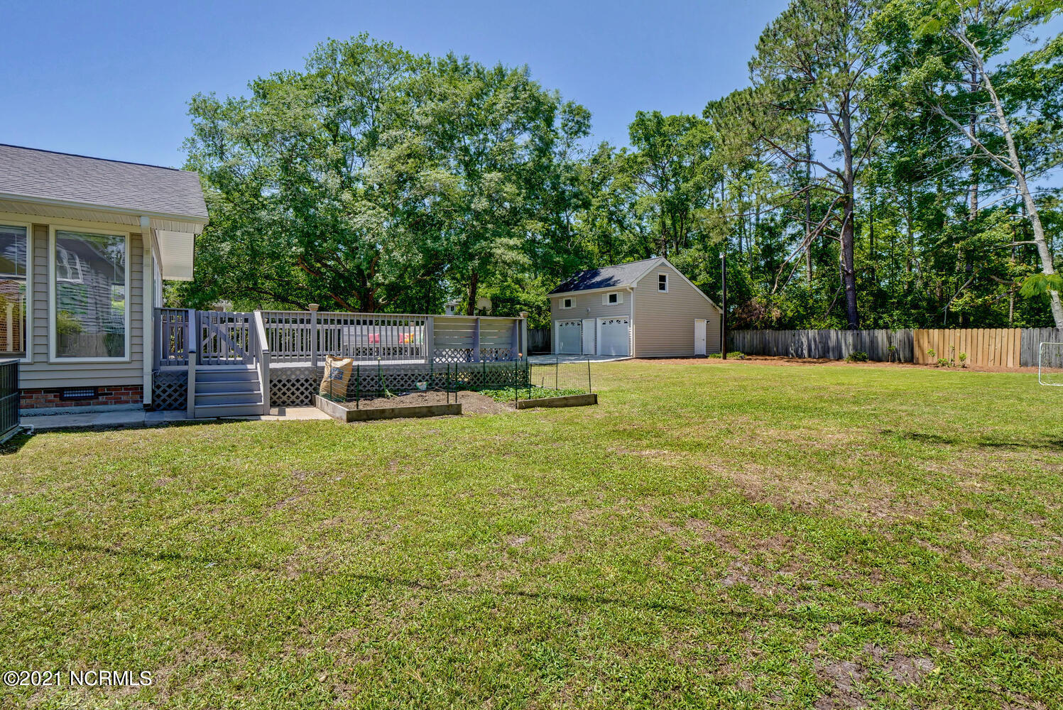 222 Quail Ridge Road Wilmington, NC 28409 - Photo 29 of 37 28 Rear yard & detached garage