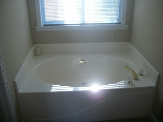 2846 Colleton Drive Marietta, GA 30066 - Photo 2 of 7 a view of a bathtub in a bathroom