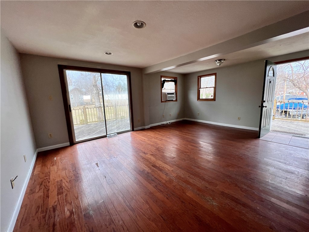 23 Lake Grove Club Decatur, IL 62521 - Photo 4 of 21 an empty room with wooden floor and windows