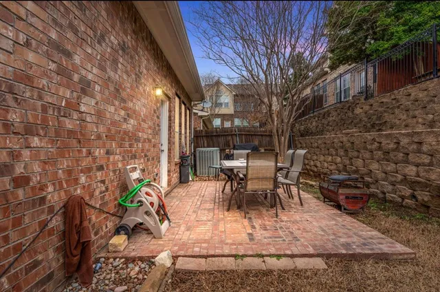 a view of outdoor sitting area with furniture