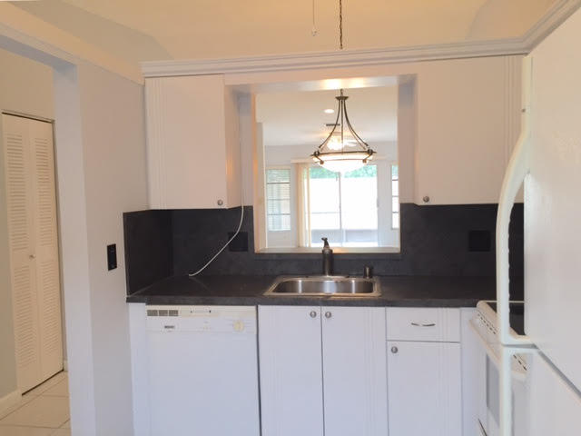 8588 Overset Lane, Unit C Boca Raton, FL 33496 - Photo 4 of 8 Kitchen 2
