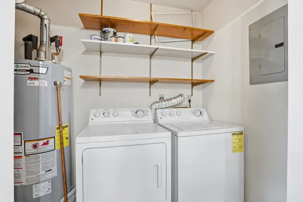 a utility room with dryer and washer