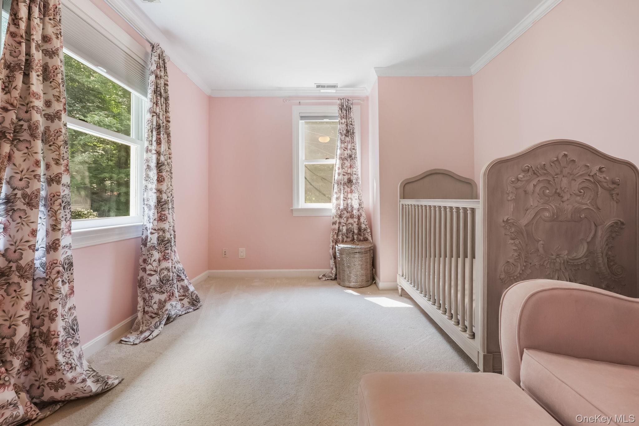 777 Armonk Road Mount Kisco, NY 10549 - Photo 29 of 44 Unfurnished bedroom with ornamental molding and carpet floors