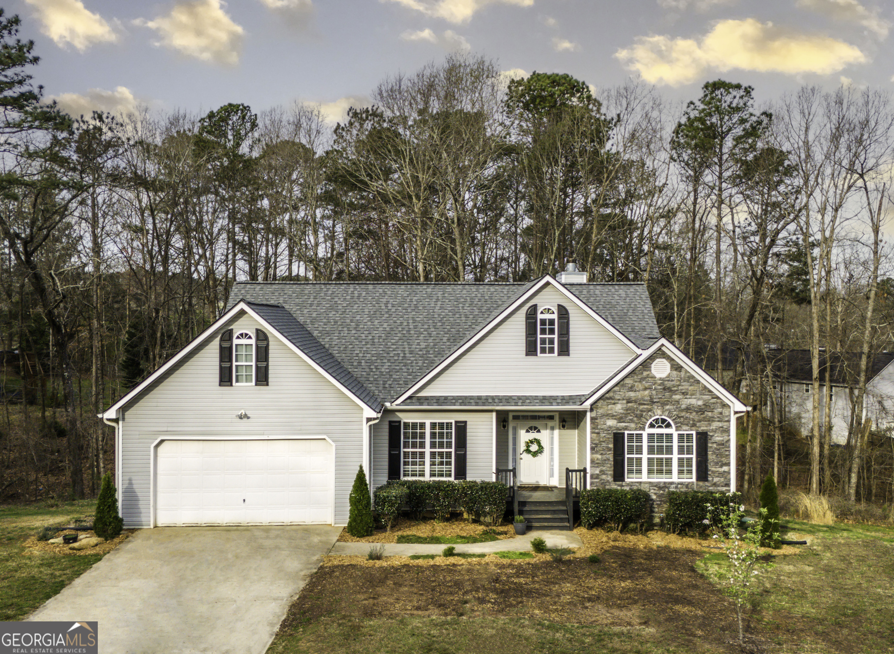 204 Taylor Ridge Trail Villa Rica, GA 30180 - Photo 1 of 1 a front view of a house with a yard and outdoor seating