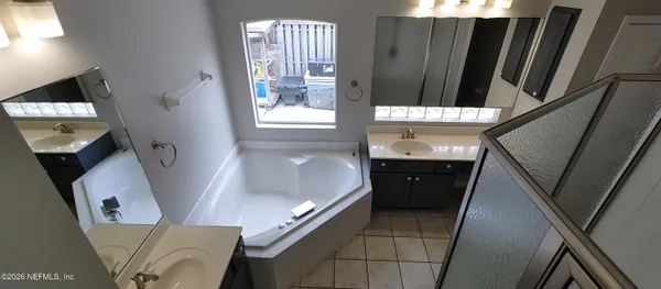 a bathroom with a sink and toilet