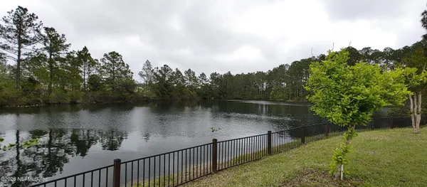 a view of a lake from a balcony