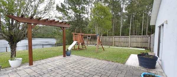 a house view with a backyard space