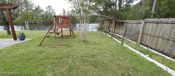 a view of a backyard with a slide