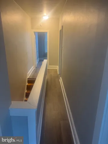 a view of hallway with stairs