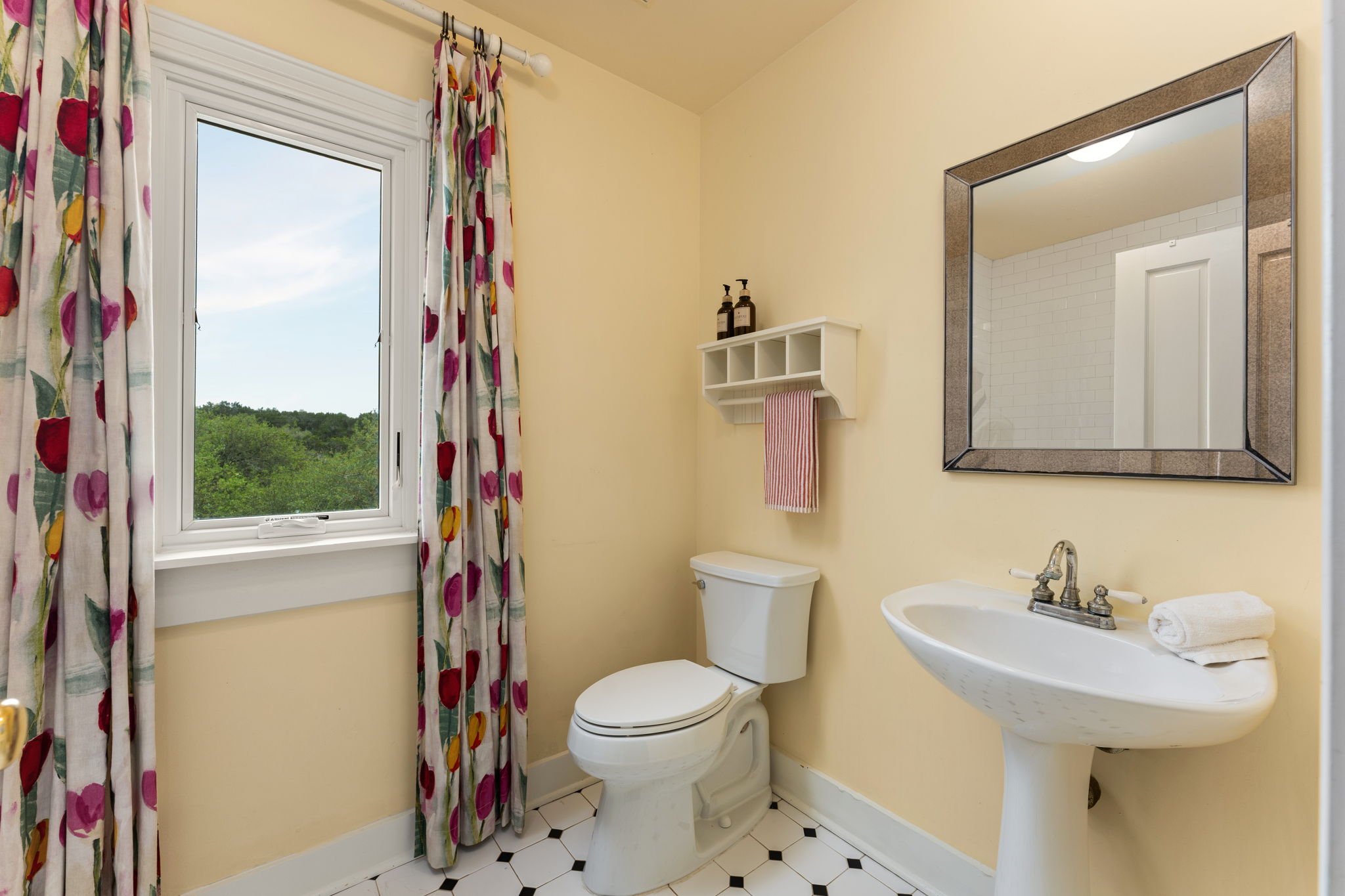3409 Gatlin Creek Road Dripping Springs, TX 78620 - Photo 22 of 40 a bathroom with a sink toilet and shower