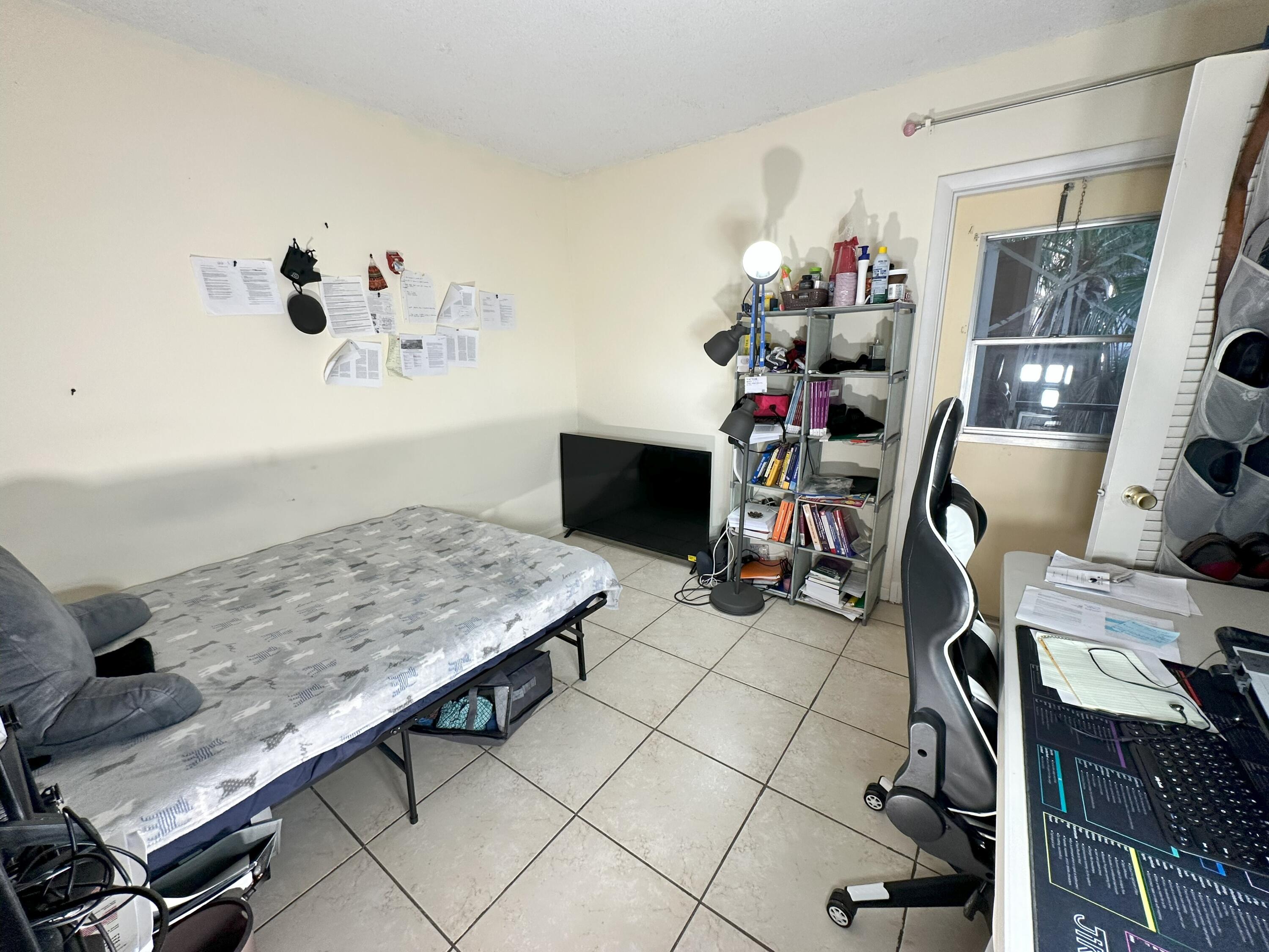 636 Northwest 13th Street, Unit 280 Boca Raton, FL 33486 - Photo 8 of 16 Guest Bedroom