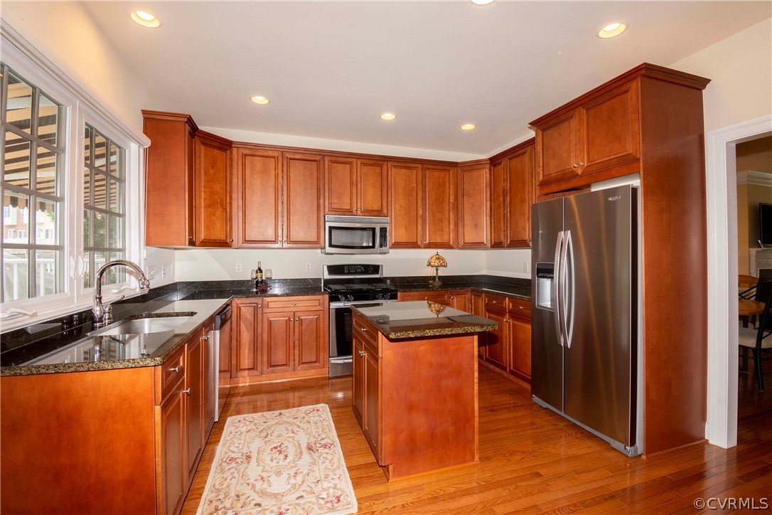 1122 Hyde Lane Henrico, VA 23229 - Photo 13 of 50 a kitchen with stainless steel appliances granite countertop a refrigerator stove microwave and sink