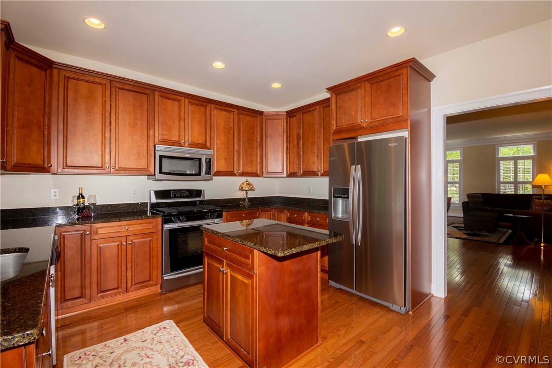 1122 Hyde Lane Henrico, VA 23229 - Photo 15 of 50 a kitchen with stainless steel appliances granite countertop a refrigerator stove and sink