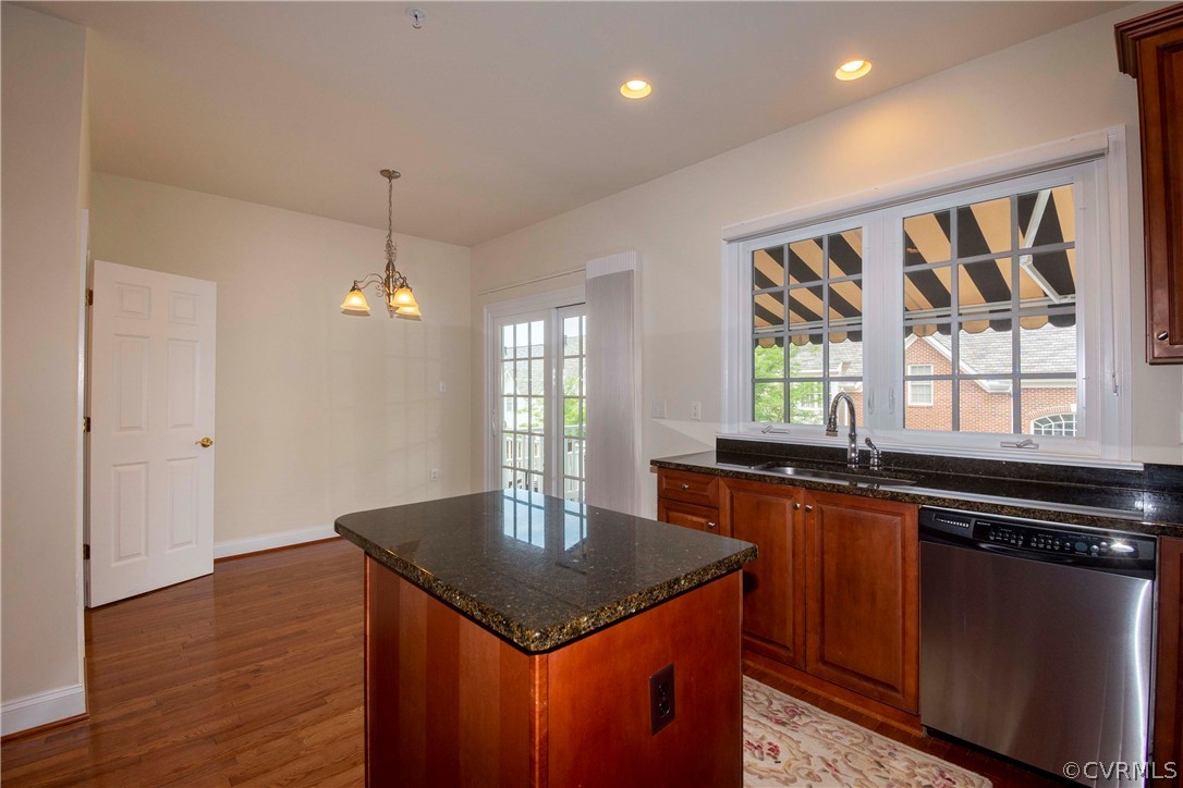 1122 Hyde Lane Henrico, VA 23229 - Photo 16 of 50 a kitchen with granite countertop a sink cabinets and window