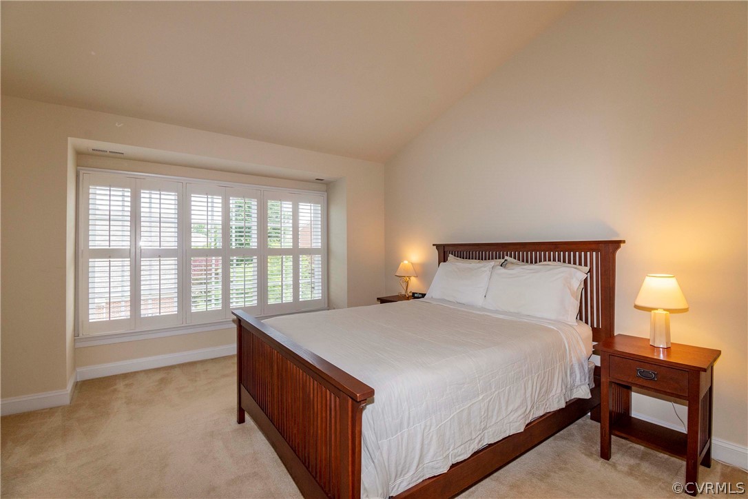 1122 Hyde Lane Henrico, VA 23229 - Photo 20 of 50 a bed room with a bed and a chair