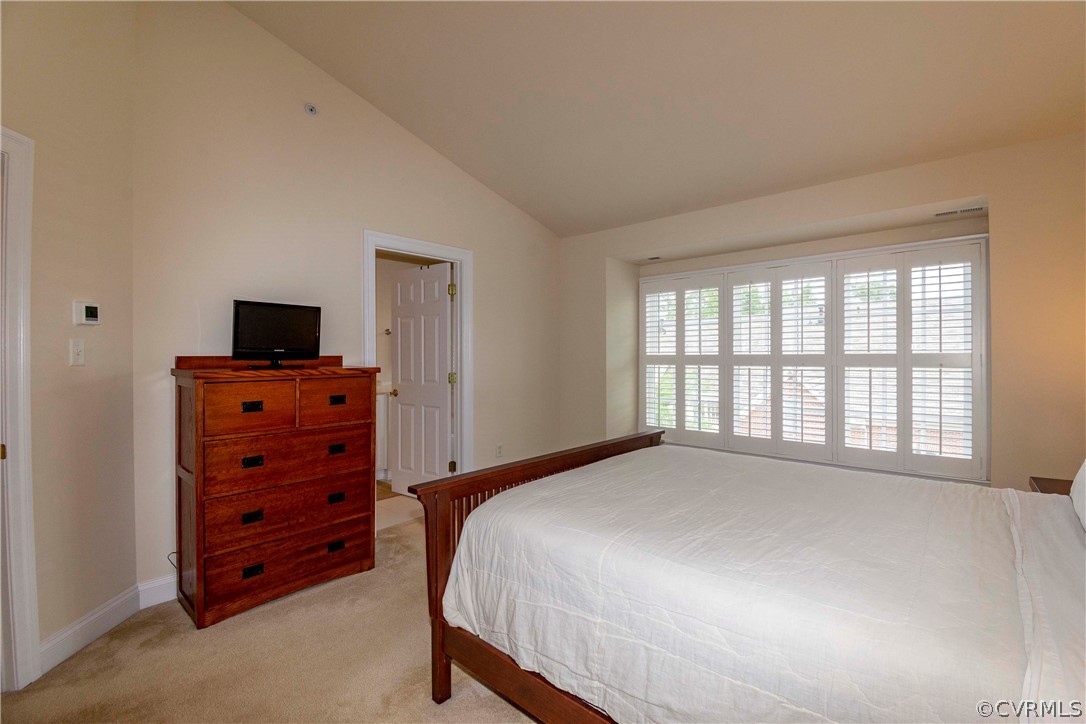 1122 Hyde Lane Henrico, VA 23229 - Photo 21 of 50 a bedroom with a bed and a tv