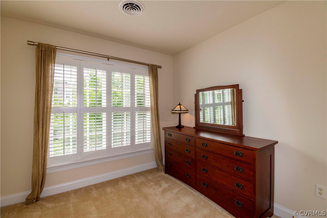 1122 Hyde Lane Henrico, VA 23229 - Photo 27 of 50 a room with a dresser and a window