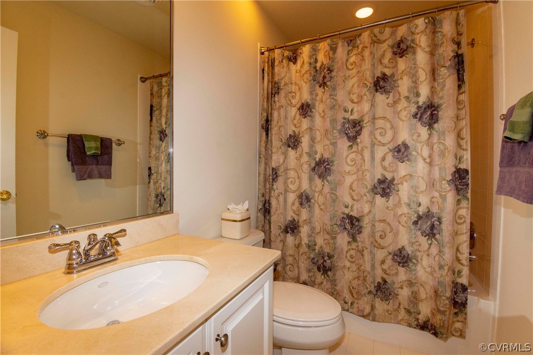 1122 Hyde Lane Henrico, VA 23229 - Photo 31 of 50 a bathroom with a sink and a mirror