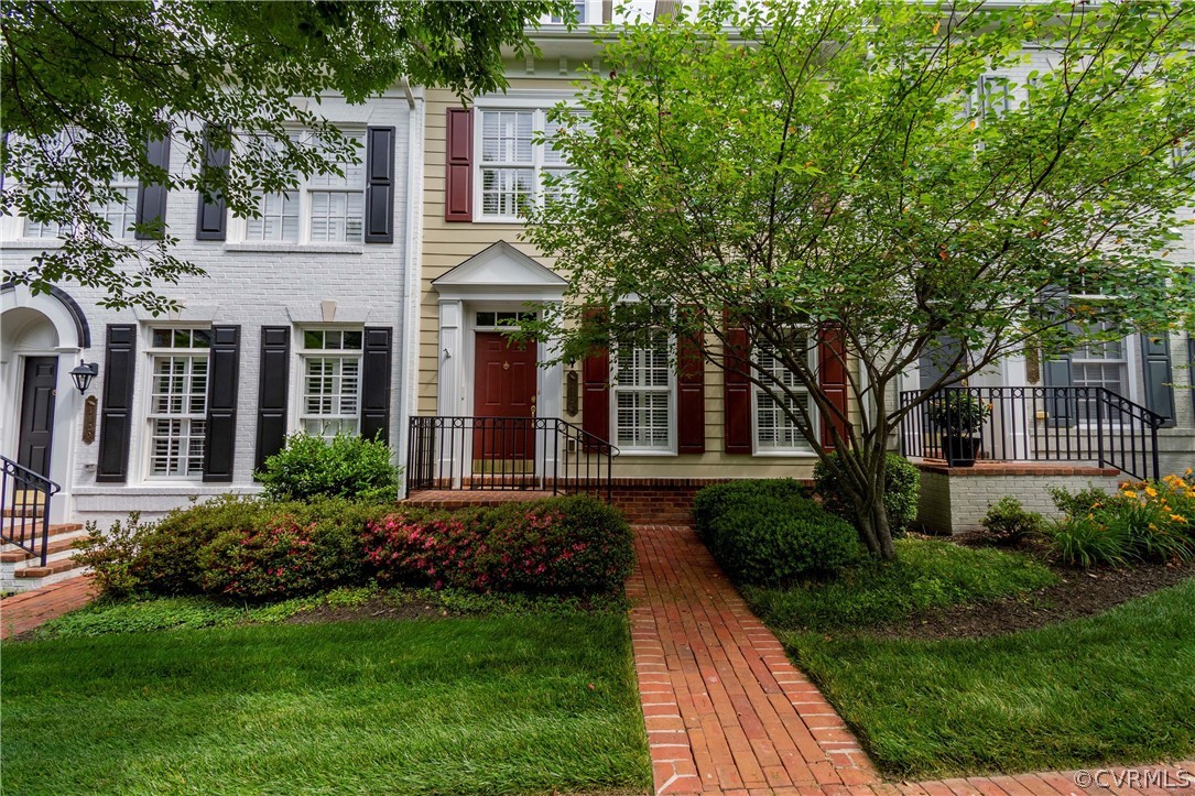 1122 Hyde Lane Henrico, VA 23229 - Photo 4 of 50 a front view of a house with a yard