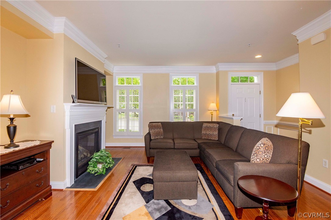 1122 Hyde Lane Henrico, VA 23229 - Photo 9 of 50 a living room with furniture fireplace and flat screen tv