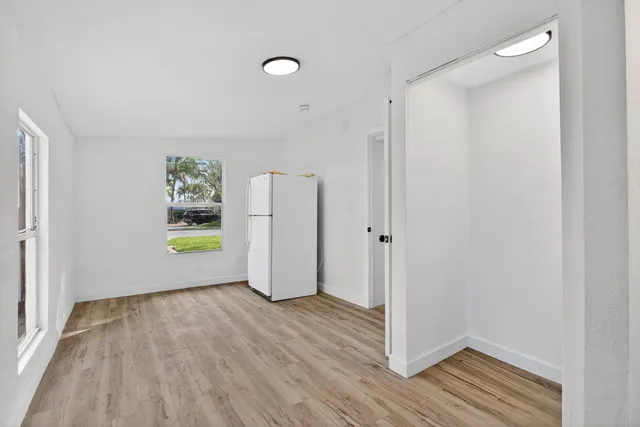 a bathroom with a sink a mirror and toilet