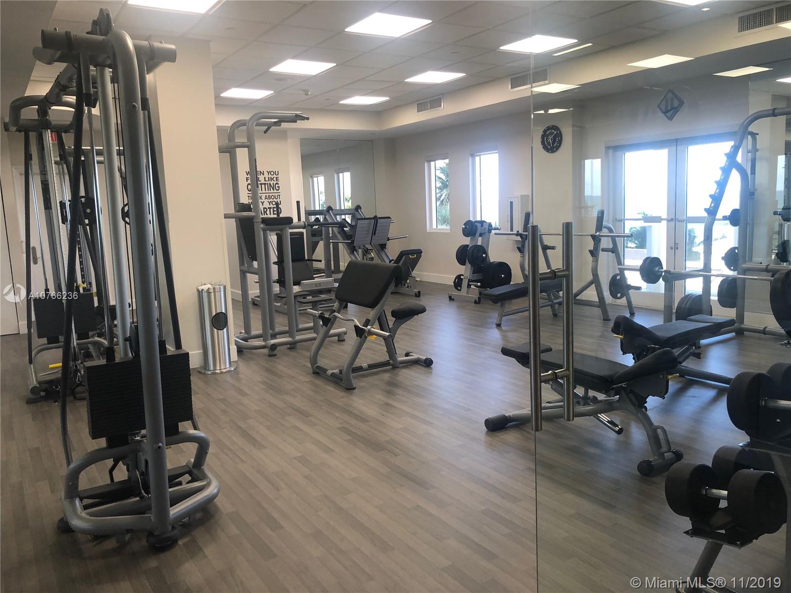 4775 Collins Avenue, Unit PH4206 Miami Beach, FL 33140 - Photo 23 of 26 Gym - Blue & Green Diamond