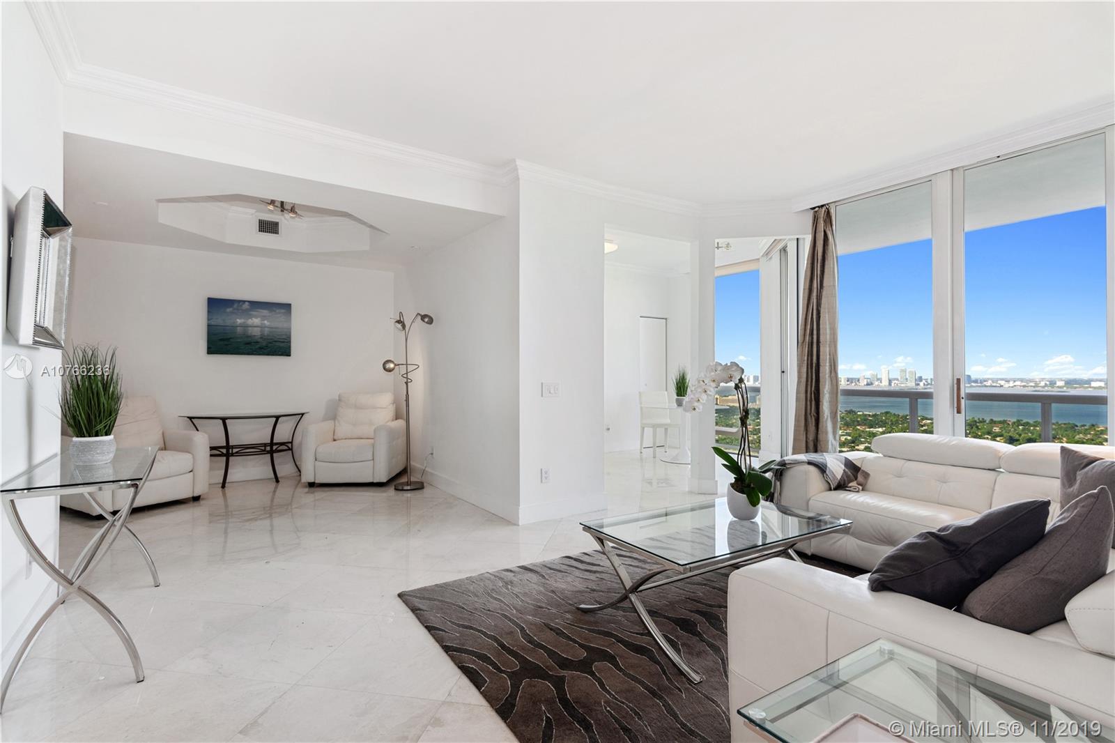 4775 Collins Avenue, Unit PH4206 Miami Beach, FL 33140 - Photo 4 of 26 Living Room and Den Area